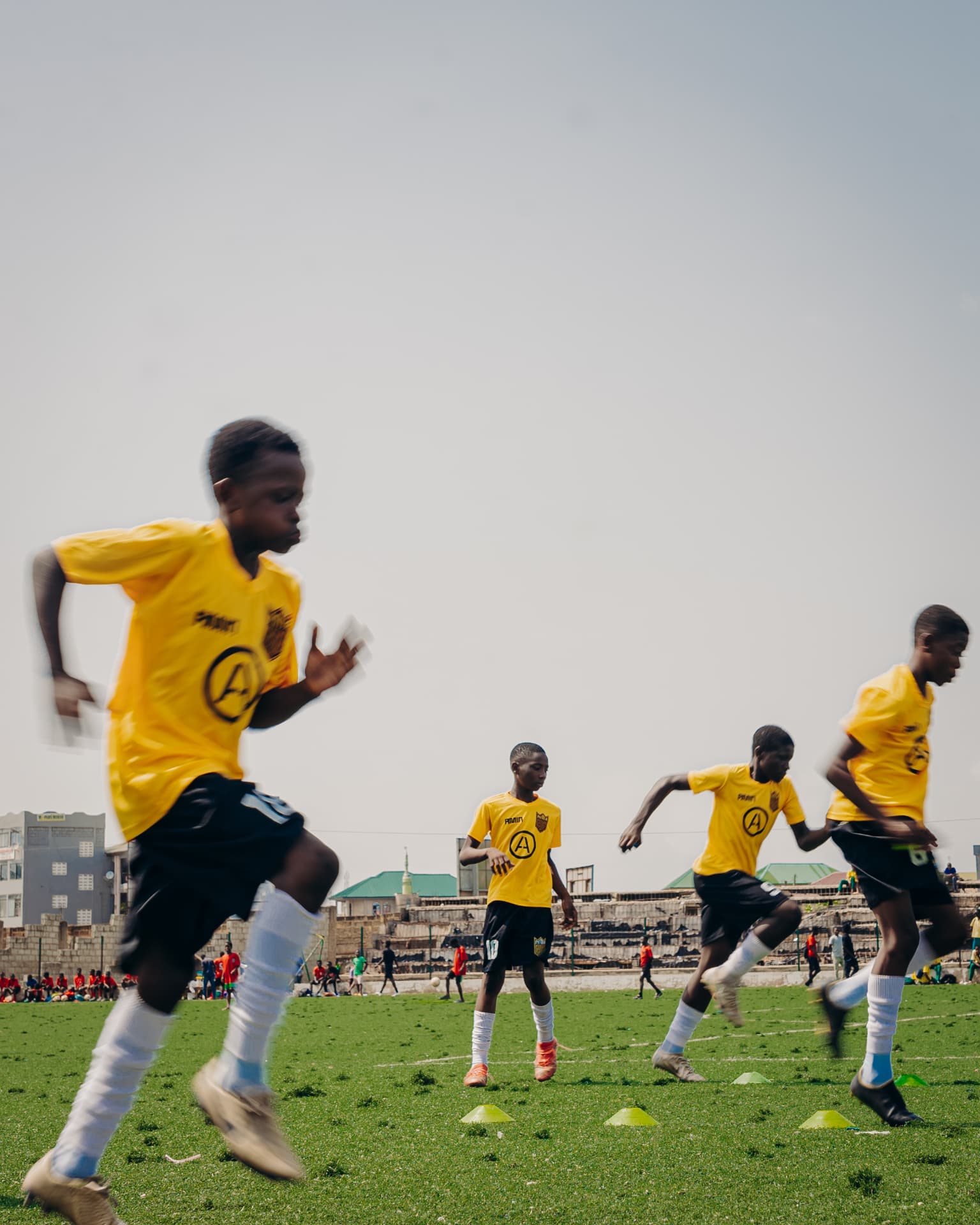Young players sprinting during a speed and agility session