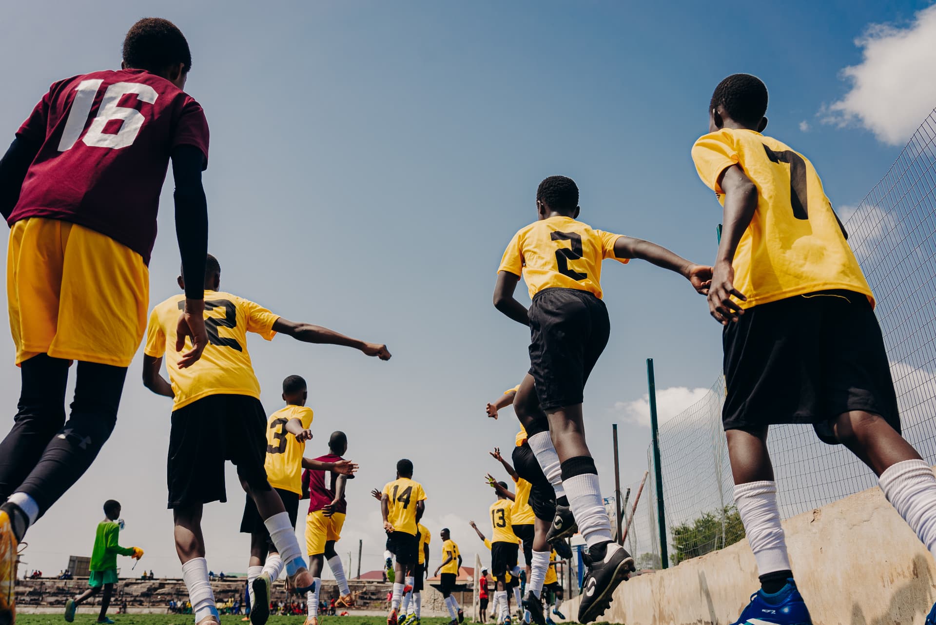 Nima Kings FC grassroots players celebrating a goal